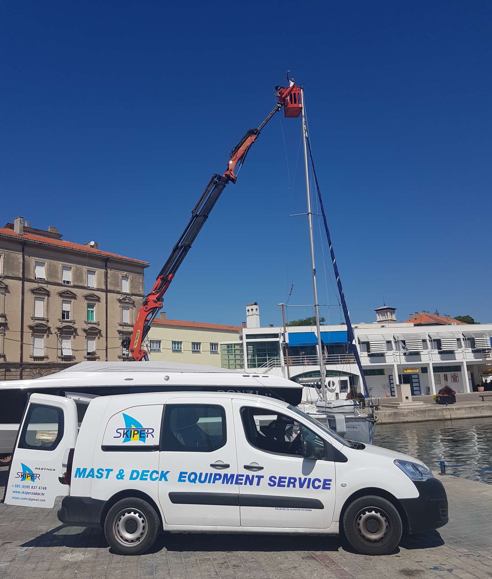 In even more demanding works on your mast we call a crane for help to lift us up in the basket